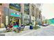 A bustling commercial streetscape with outdoor seating at local retail establishment at 135 Edgewater Trl, Fayetteville, GA 30215