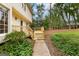 Backyard deck and landscaped yard of the house at 108 Summit Walk, Peachtree City, GA 30269