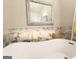 Modern bathroom with a soaking tub and neutral decor at 108 Summit Walk, Peachtree City, GA 30269