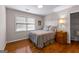 Bedroom featuring a wood floor and view to a window at 108 Summit Walk, Peachtree City, GA 30269