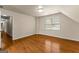 Neutral bedroom with wood floors and natural light from the window at 108 Summit Walk, Peachtree City, GA 30269