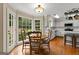 Cozy eat-in kitchen with stainless steel appliances and lovely outdoor view at 108 Summit Walk, Peachtree City, GA 30269