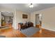 Inviting seating area with hardwood floors, rug, and an open floor plan at 108 Summit Walk, Peachtree City, GA 30269