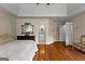 Spacious primary bedroom boasts hardwood floors and access to an ensuite bathroom at 108 Summit Walk, Peachtree City, GA 30269
