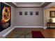 Spacious basement with modern flooring, neutral walls, and stylish decor, perfect for entertaining or relaxing at 8035 Magnolia Way, Roswell, GA 30075