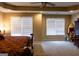 Bedroom with large armoire, mirror, and neutral carpet at 8035 Magnolia Way, Roswell, GA 30075
