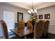 Charming dining area featuring a rustic table and window views at 8035 Magnolia Way, Roswell, GA 30075