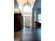 Grand foyer with soaring ceilings and an arched window at 8035 Magnolia Way, Roswell, GA 30075