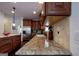 Modern kitchen with granite counters, stainless steel appliances, and ample cabinet space at 8035 Magnolia Way, Roswell, GA 30075