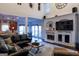 Inviting living room with fireplace, open floor plan, and seamless flow to kitchen at 8035 Magnolia Way, Roswell, GA 30075