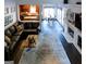 Open-concept living area with fireplace, seamlessly connected to the kitchen and dining at 8035 Magnolia Way, Roswell, GA 30075