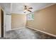 Bedroom with stone tile flooring, ceiling fan, and two windows at 1854 Shadydale Se Ave, Atlanta, GA 30315