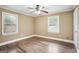 Bedroom with hardwood floors and two large windows for natural light at 1854 Shadydale Se Ave, Atlanta, GA 30315