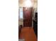Entryway with wood front door, tile floor, and shoe storage at 1058 Viking Dr, Stone Mountain, GA 30083
