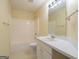 Neutral full bathroom with shower-tub combination, single sink vanity, and tile flooring at 105 Providence Ct, Carrollton, GA 30116
