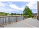Spacious deck with scenic views of the lake and surrounding greenery at 105 Providence Ct, Carrollton, GA 30116
