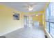 Bright dining area with tile floor, yellow walls, and a bar at 105 Providence Ct, Carrollton, GA 30116