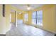 Bright dining area with tile floor, yellow walls, and a bar at 105 Providence Ct, Carrollton, GA 30116