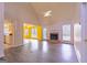 A bright living room with a fireplace and hardwood floors, perfect for relaxing or entertaining at 105 Providence Ct, Carrollton, GA 30116