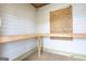 Outbuilding with painted walls and work bench, providing a functional workspace at 105 Providence Ct, Carrollton, GA 30116