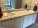 Bathroom featuring double sink vanity with white cabinets, and large mirror at 1744 Campbell Rd, Covington, GA 30014