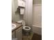 Bathroom featuring toilet, a bathtub-shower combination and a sink with a tan countertop at 1744 Campbell Rd, Covington, GA 30014