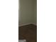 Neutral bedroom with simple trim and carpet floors at 1744 Campbell Rd, Covington, GA 30014