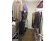 Walk-in closet with clothing, accessories, shelving, and carpet flooring at 1744 Campbell Rd, Covington, GA 30014