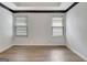 Bright and airy bedroom with hardwood floors and natural light at 323 Newfield Way, Peachtree City, GA 30269