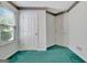 Bedroom featuring carpeted floors and a window at 323 Newfield Way, Peachtree City, GA 30269