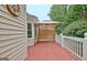 Well-maintained deck with a gazebo, offering a tranquil spot to unwind amidst lush greenery at 323 Newfield Way, Peachtree City, GA 30269