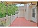 Charming deck featuring a gazebo and colorful lights, ideal for entertaining guests outdoors at 323 Newfield Way, Peachtree City, GA 30269