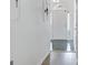 Bright foyer featuring tiled flooring transitioning to hardwood floors and a light-filled entrance at 323 Newfield Way, Peachtree City, GA 30269
