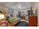 Spacious bedroom with fan lighting, decorative wall hangings, and ample storage at 3570 Keels Ln, Atlanta, GA 30349