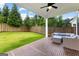 Inviting back patio with modern outdoor furniture set, looking out to the yard at 1102 Maybeck Way, Peachtree City, GA 30269