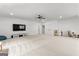 Expansive basement with neutral carpet, recessed lighting, ceiling fan, and lots of space for storage at 1102 Maybeck Way, Peachtree City, GA 30269