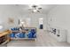 Well-lit bedroom with playful decor, carpeted floors, adjacent bathroom, and ample storage at 1102 Maybeck Way, Peachtree City, GA 30269