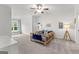 Bright bedroom with a car-themed toddler bed, decor, and a window bench at 1102 Maybeck Way, Peachtree City, GA 30269