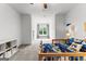 Bright bedroom with a car-themed bed and decor, plus a window bench at 1102 Maybeck Way, Peachtree City, GA 30269