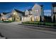Charming two-story home with a two-car garage and beautifully landscaped front yard at night at 1102 Maybeck Way, Peachtree City, GA 30269