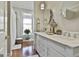 Elegant bathroom with a double vanity, oval mirrors, and a separate shower at 395 W Mcintosh Rd, Brooks, GA 30205