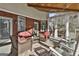Inviting covered patio with comfortable seating, perfect for relaxing and entertaining outdoors at 395 W Mcintosh Rd, Brooks, GA 30205