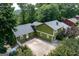 Well-maintained two-story home with a large backyard and lush surrounding greenery at 3778 Berdon Ln, Decatur, GA 30034