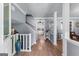 Welcoming foyer showcasing hardwood floors, an open staircase, and access to multiple rooms in the home at 3778 Berdon Ln, Decatur, GA 30034