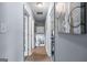 Hallway showcasing hardwood floors and natural light, connecting the home's living spaces at 3778 Berdon Ln, Decatur, GA 30034