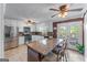 Spacious kitchen with stainless steel appliances, a center island, and access to an outdoor deck at 3778 Berdon Ln, Decatur, GA 30034