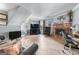 Inviting living room featuring a brick fireplace and modern furniture, creating a warm and comfortable ambiance at 3778 Berdon Ln, Decatur, GA 30034