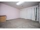 Clean and organized bedroom offers ample storage with double closets, providing a clutter-free living space at 7392 N Mitchell Ct, Villa Rica, GA 30180