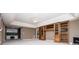 Spacious living room features built-in bookshelves and a cozy atmosphere for relaxation and entertainment at 7392 N Mitchell Ct, Villa Rica, GA 30180