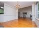View from the dining room into a large living room, showcasing the open floor plan at 7392 N Mitchell Ct, Villa Rica, GA 30180